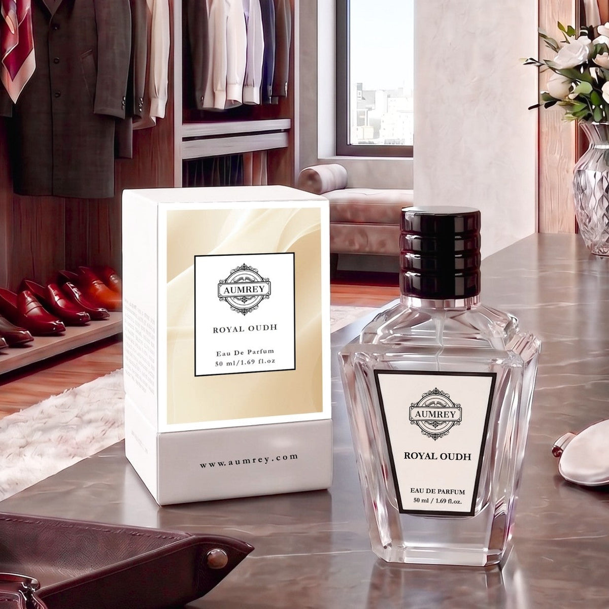 A bottle of Aumey's Royal Oudh Eau De Parfum next to its white and gold packaging box, displayed on a polished marble table in a luxurious, upscale dressing room setting.